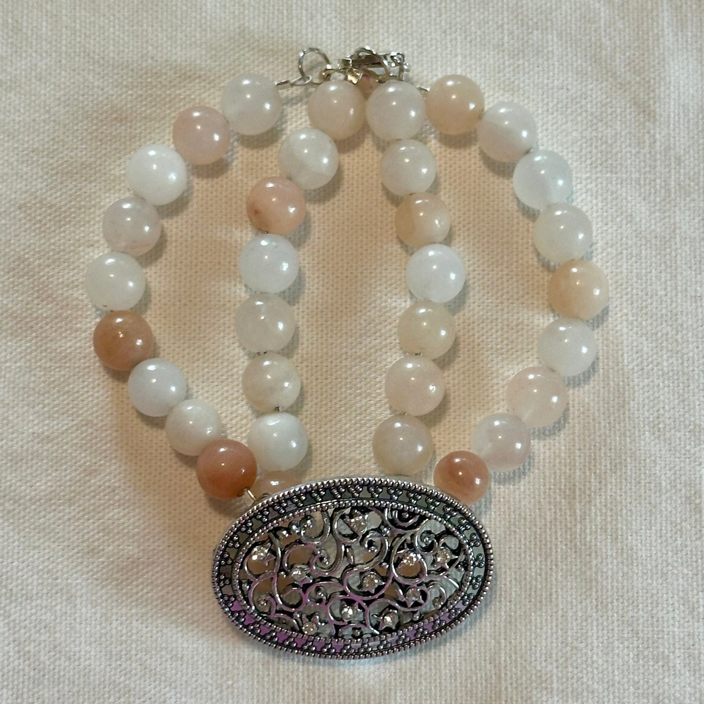 Pink Aurora Borealis Opal Two-Stand Bracelet with Oval Silver Center