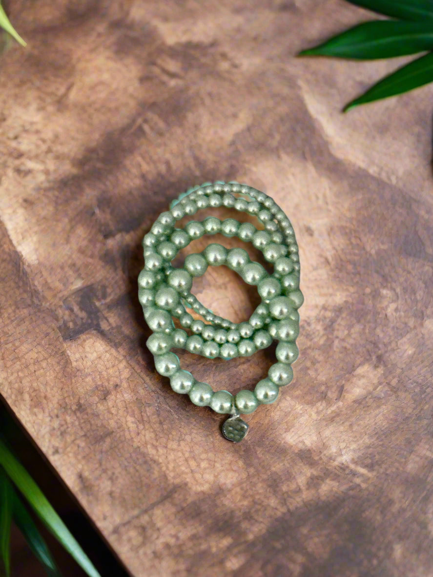 Set of Four Stackable Mint Green Glass Plearl Bracelets