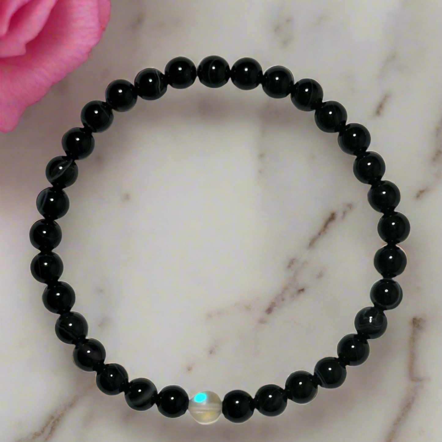 Banded Black Agate With White Synthetic Opal Center Bead Bracelet