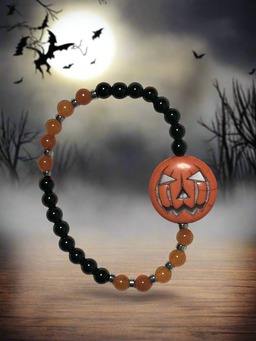 Black Jasper, Orange Quartzite, Hematine and Reconstituted Orange Howlite Bead Bracelet