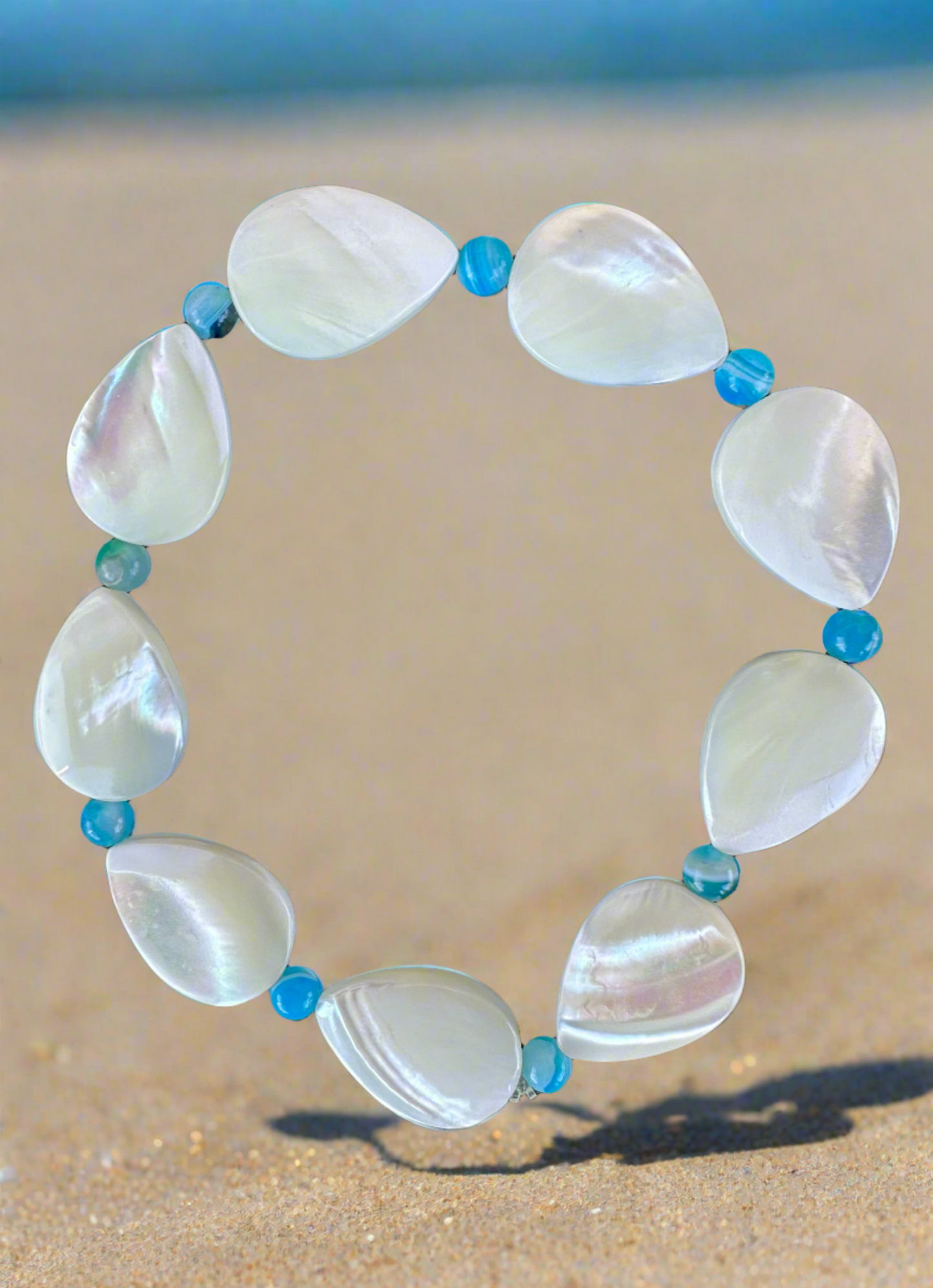 White Mother of Pearl Teardrop and Striped Blue Agate Bracelet