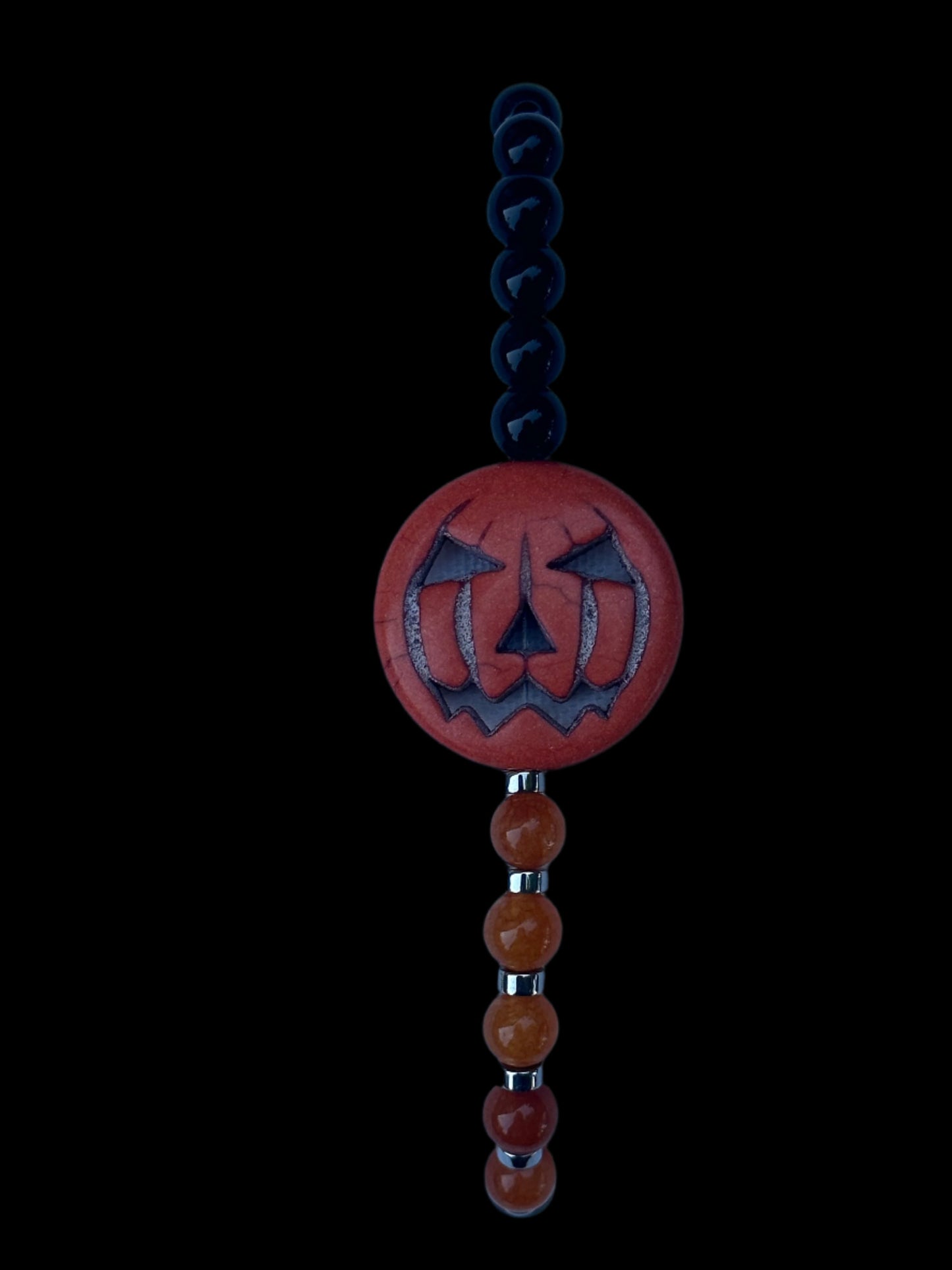 Black Jasper, Orange Quartzite, Hematine and Reconstituted Orange Howlite Bead Bracelet
