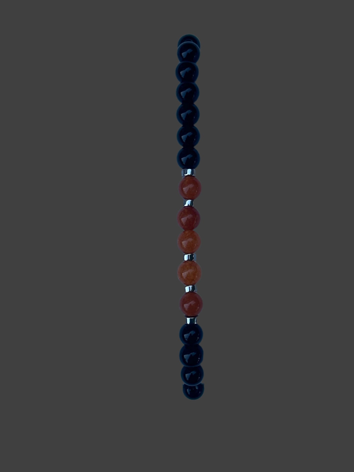 Black Jasper, Orange Quartzite, Hematine and Reconstituted Orange Howlite Bead Bracelet