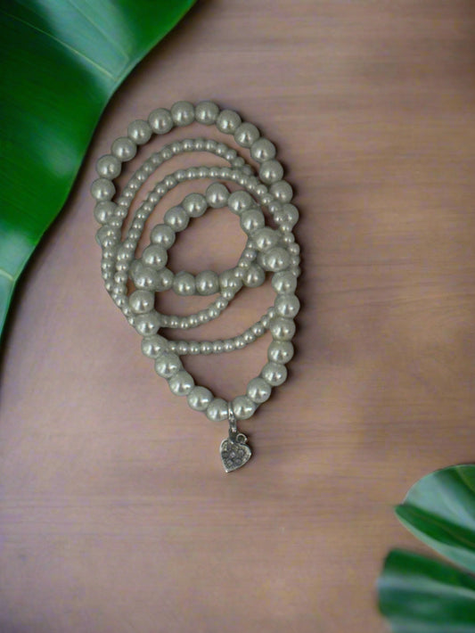 Set of Four White Glass Pearl Stackable Bracelets