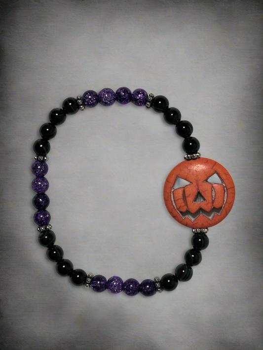 Black Striped Agate, Purple Crackle Quartz With a 25 mm Pumpkin Center Bead Bracelet