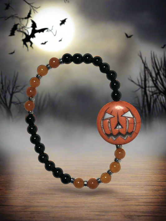 Black Jasper, Orange Quartzite, Hematine and Reconstituted Orange Howlite Bead Bracelet