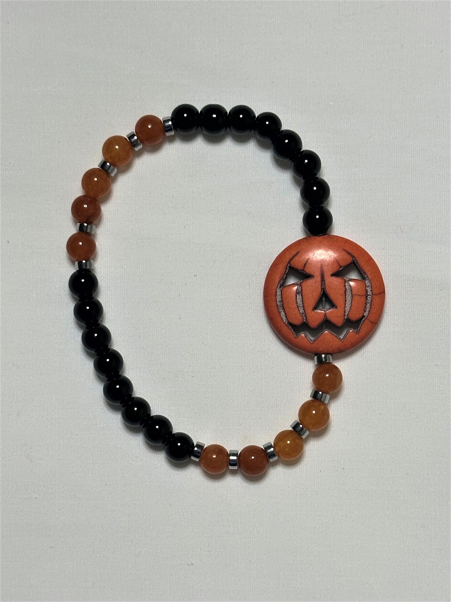 Black, Orange and Purple Bead Bracelet With 25 mm Pumpkin Center Stone